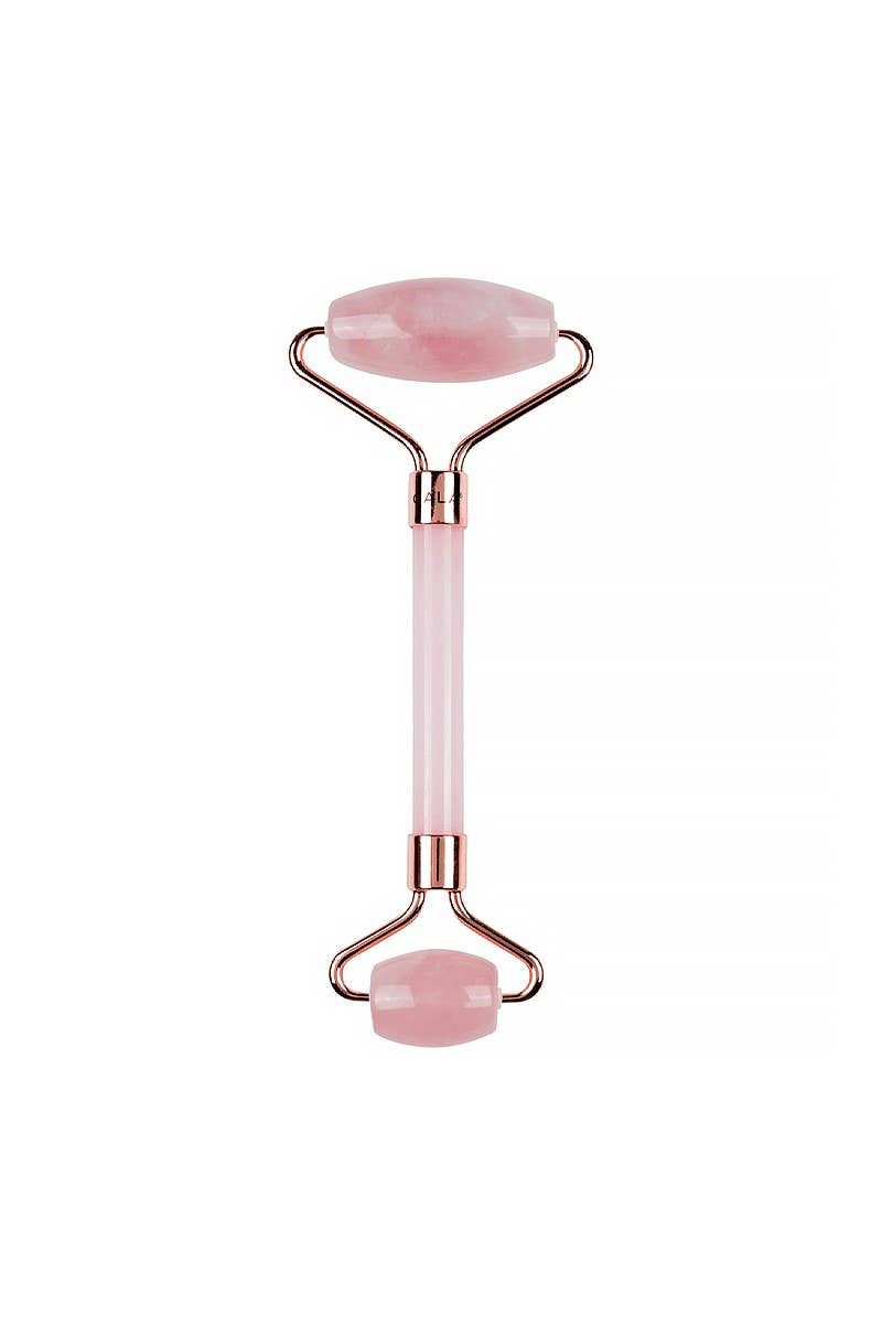 Rouleau facial en quartz rose avec détails dorés